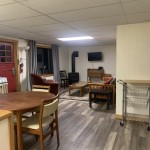 View from hallway into kitchen and living room